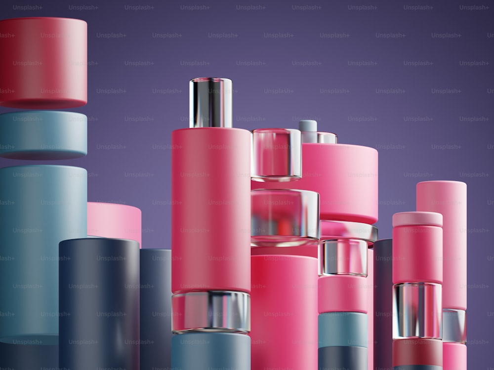 a group of pink and blue cylindrical objects