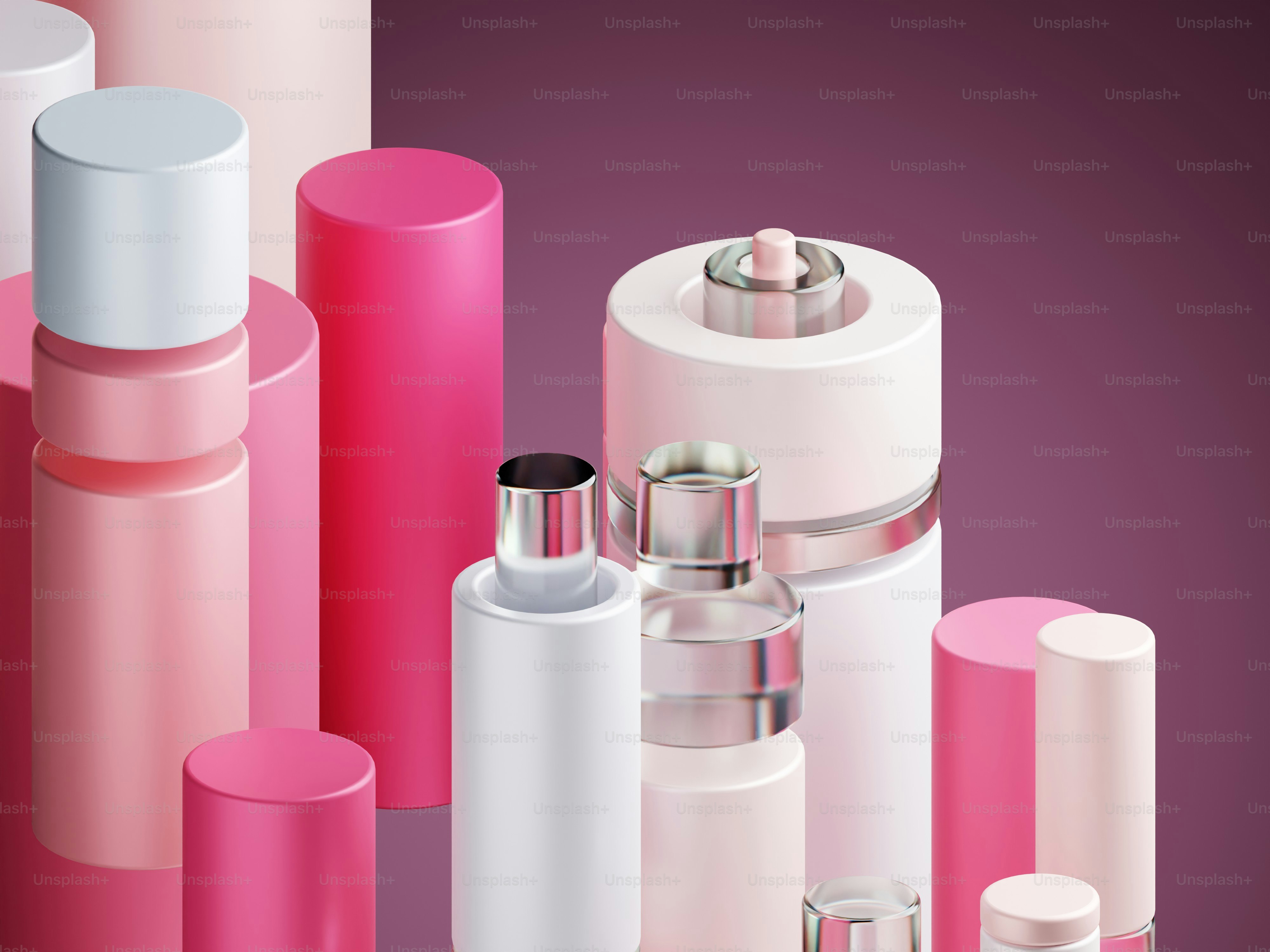 A group of pink and white cylindrical objects photo Cyclinders Image
