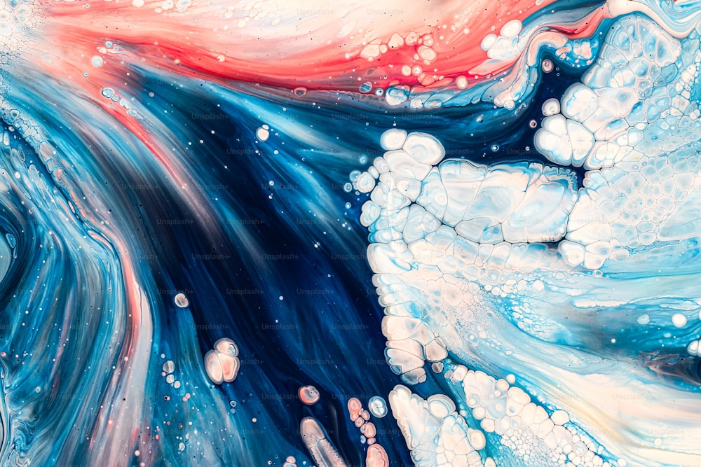 a painting of blue, red, and white swirls and bubbles