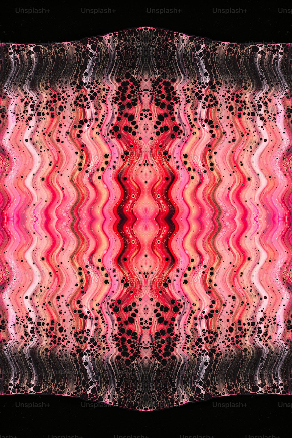 a pink and black pattern with a black background