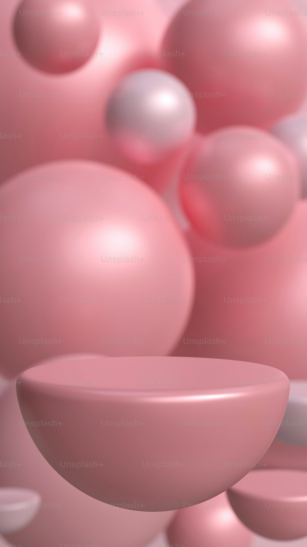 un mucchio di palline rosa che fluttuano nell'aria