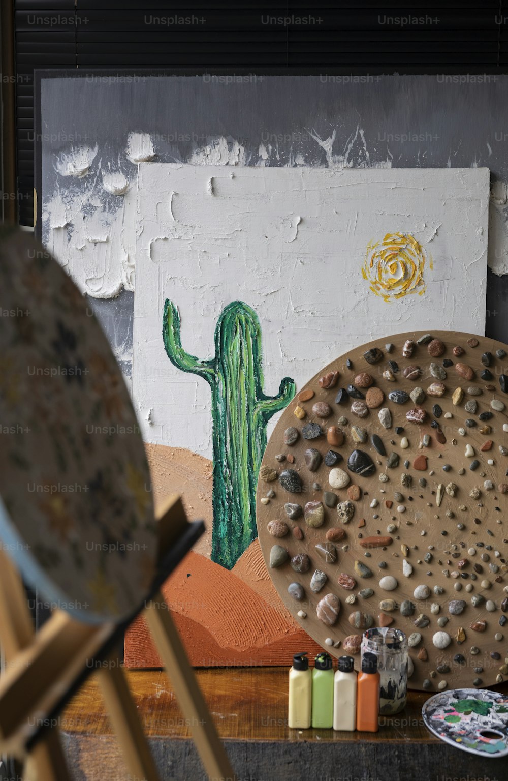 a picture of a cactus on a wall
