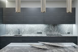 a kitchen with a marble counter top next to a sink
