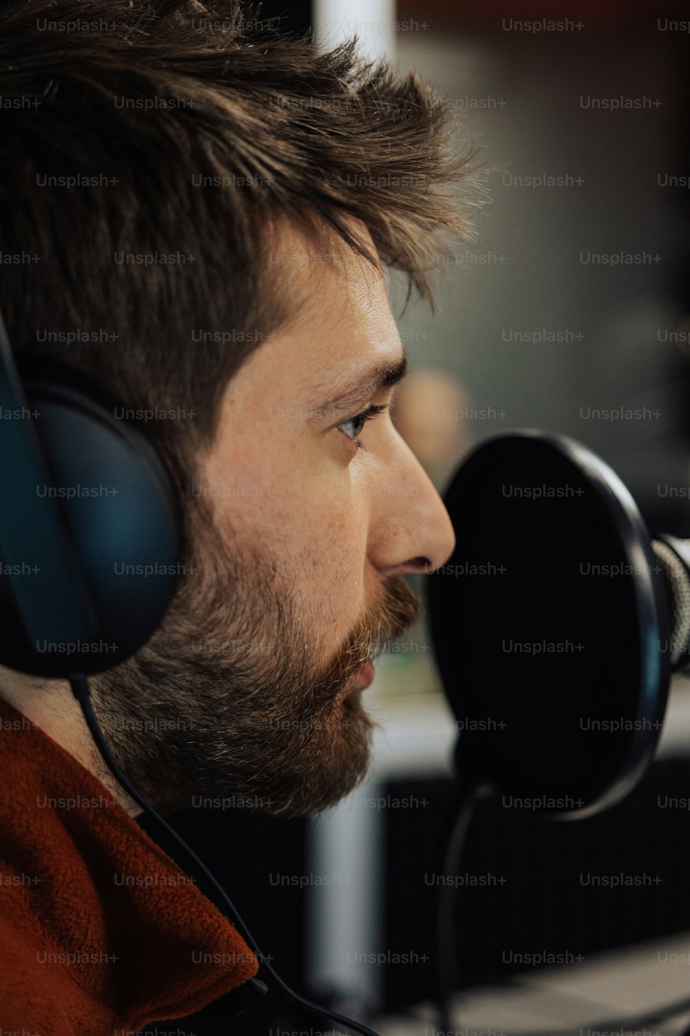 a man with a beard wearing headphones