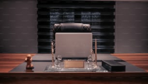 a laptop computer sitting on top of a wooden desk