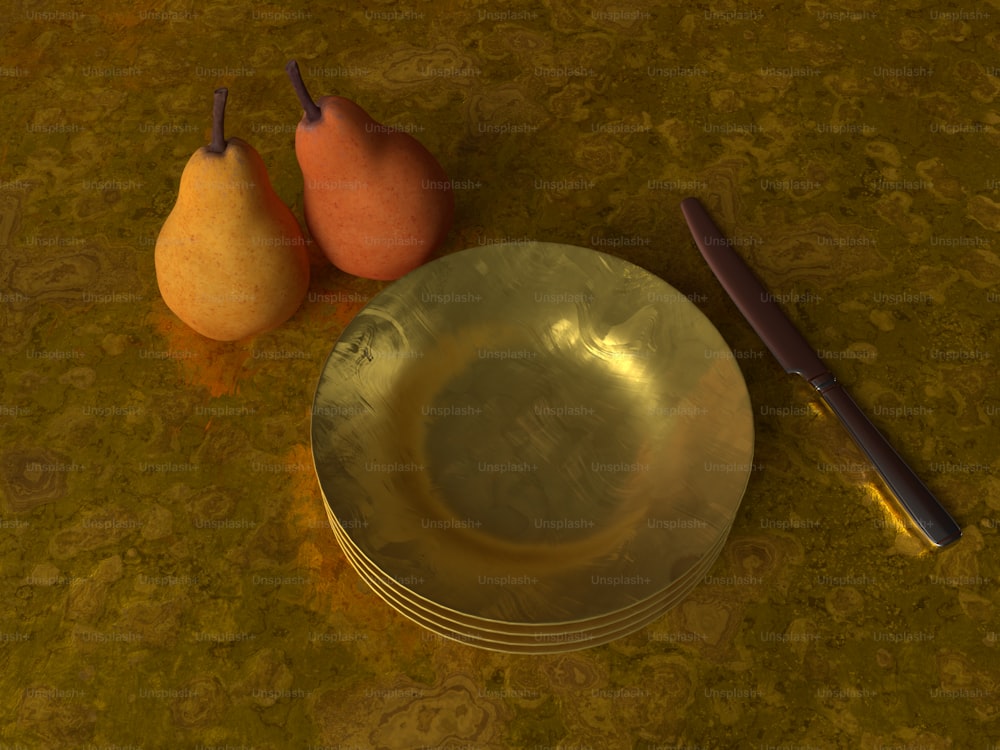 un bol en métal et deux poires sur une table