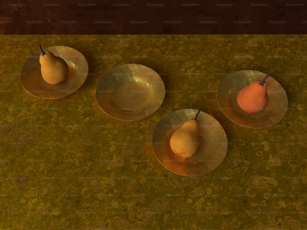 three metal bowls with fruit in them on a table