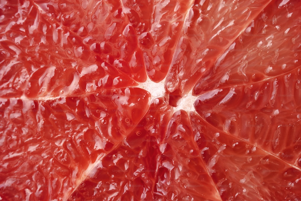 a close up of a grapefruit cut in half