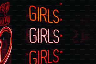 a neon sign that says girls, girls, girls