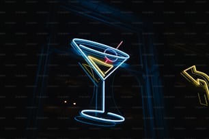 Un'insegna al neon con un martini in esso