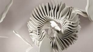 a sculpture made out of white paper on a wall