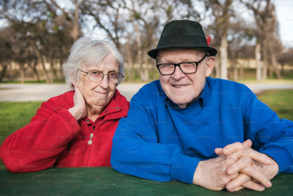 a man and a woman are sitting at a table