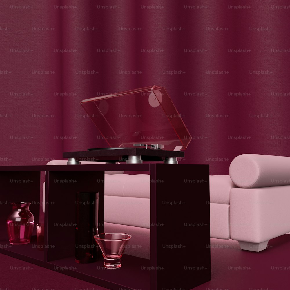 a living room with a couch and a table with a record player on it