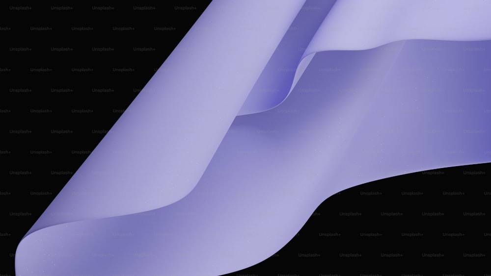 a close up of a black background with a purple wave