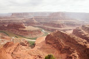 a view of a river in the middle of a canyon