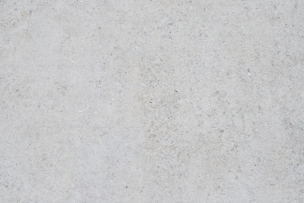 a close up of a white marble surface