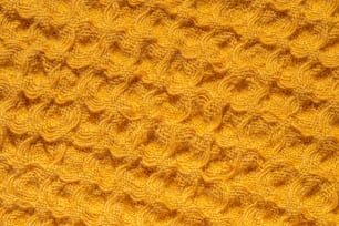 黄色いニット毛布のクローズアップ