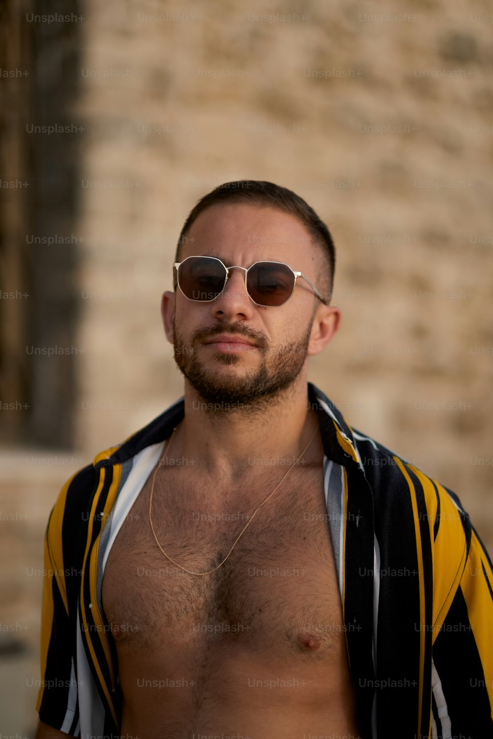 Premium Photo  Fashion portrait of a very muscular sexy man in