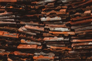 a pile of wooden planks stacked on top of each other