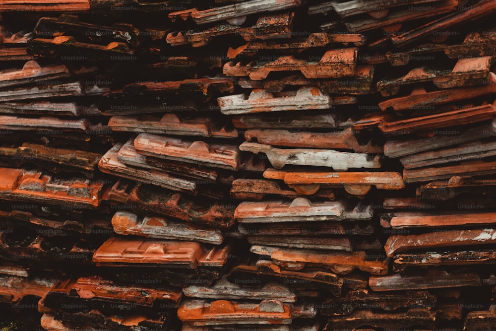 a pile of wooden planks stacked on top of each other