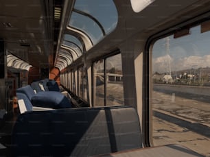 the inside of a train looking out the window