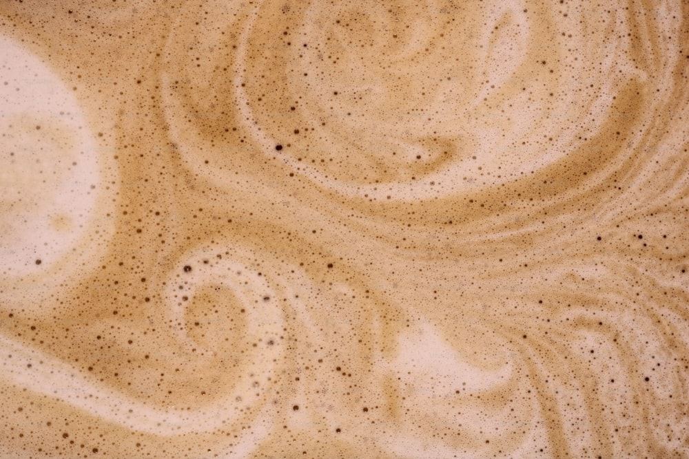 a close up of a brown substance in a bowl