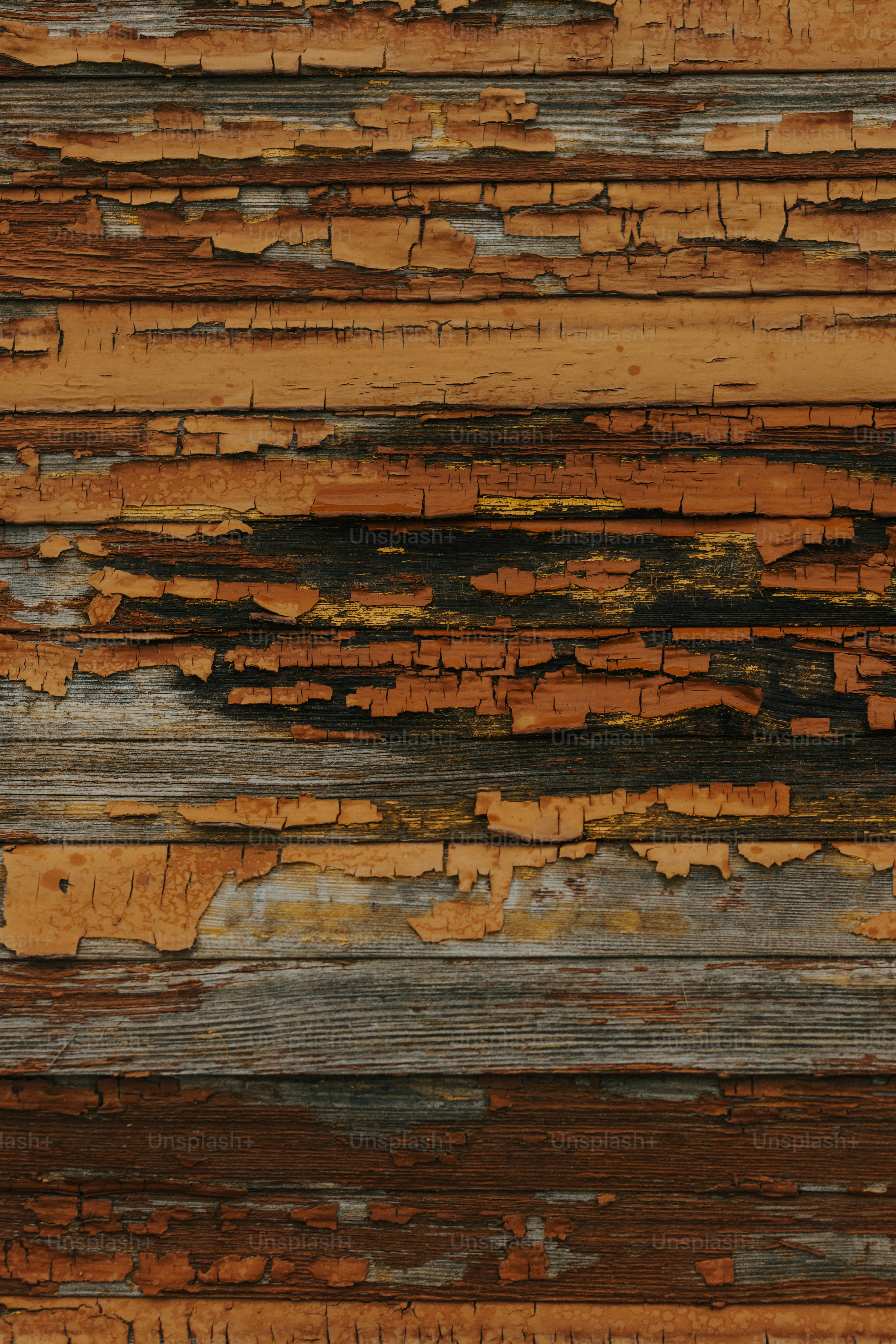 a piece of wood that is peeling and chipping