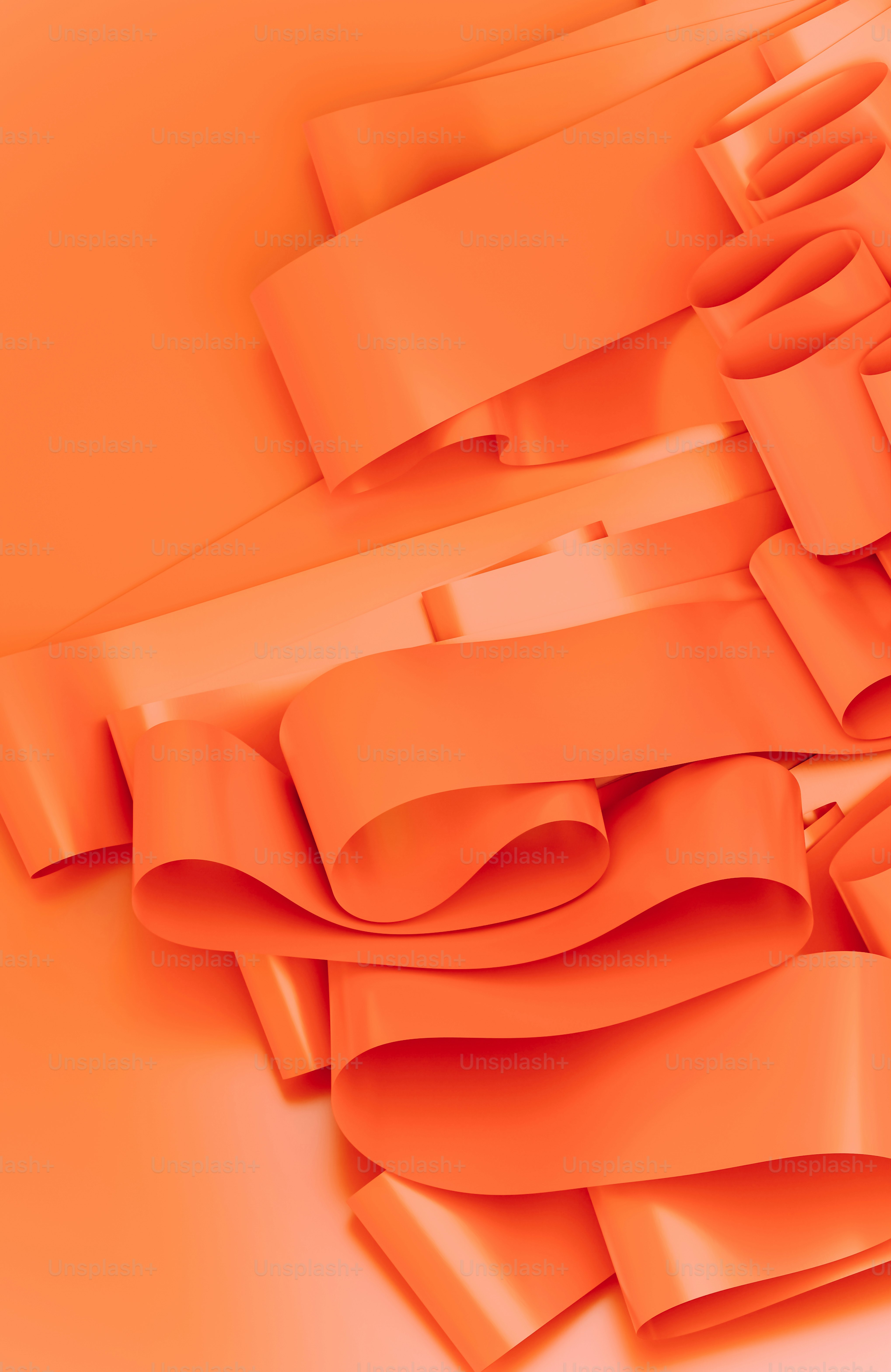 a bunch of orange ribbons on a yellow background