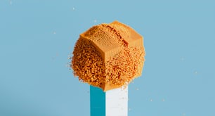 a close up of a piece of food on a stick