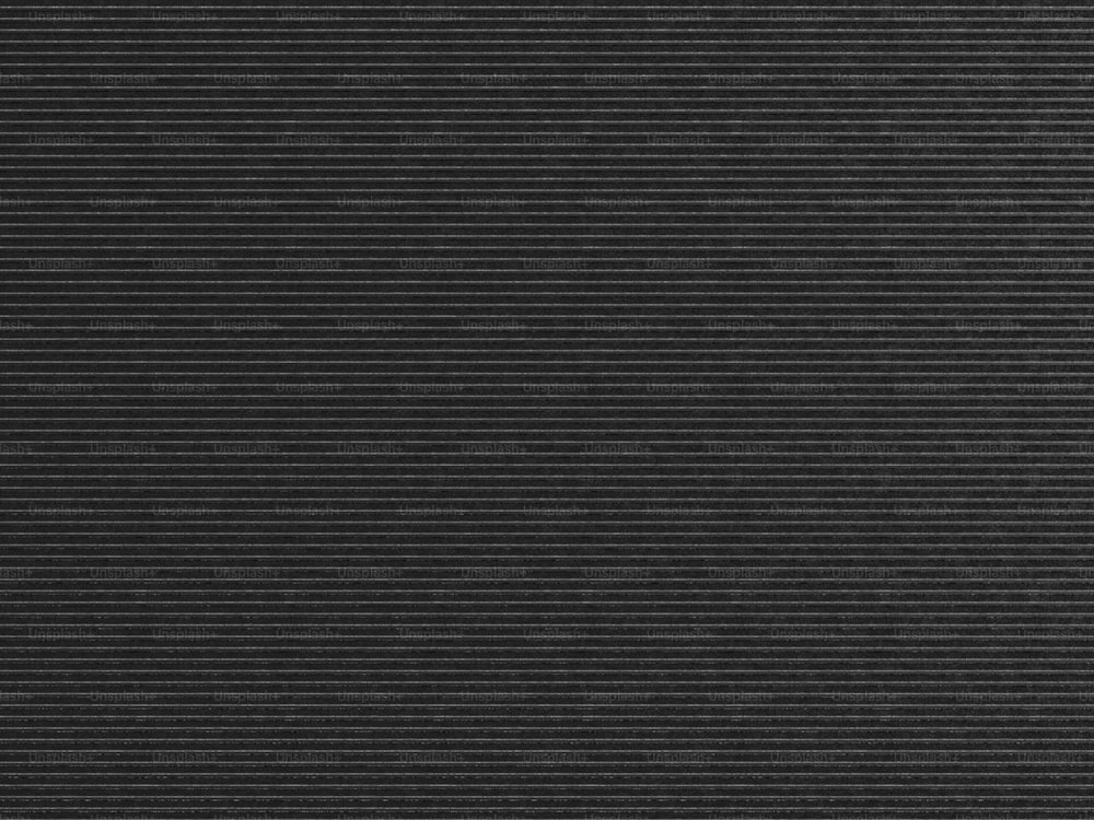 Un primer plano de un fondo negro texturizado