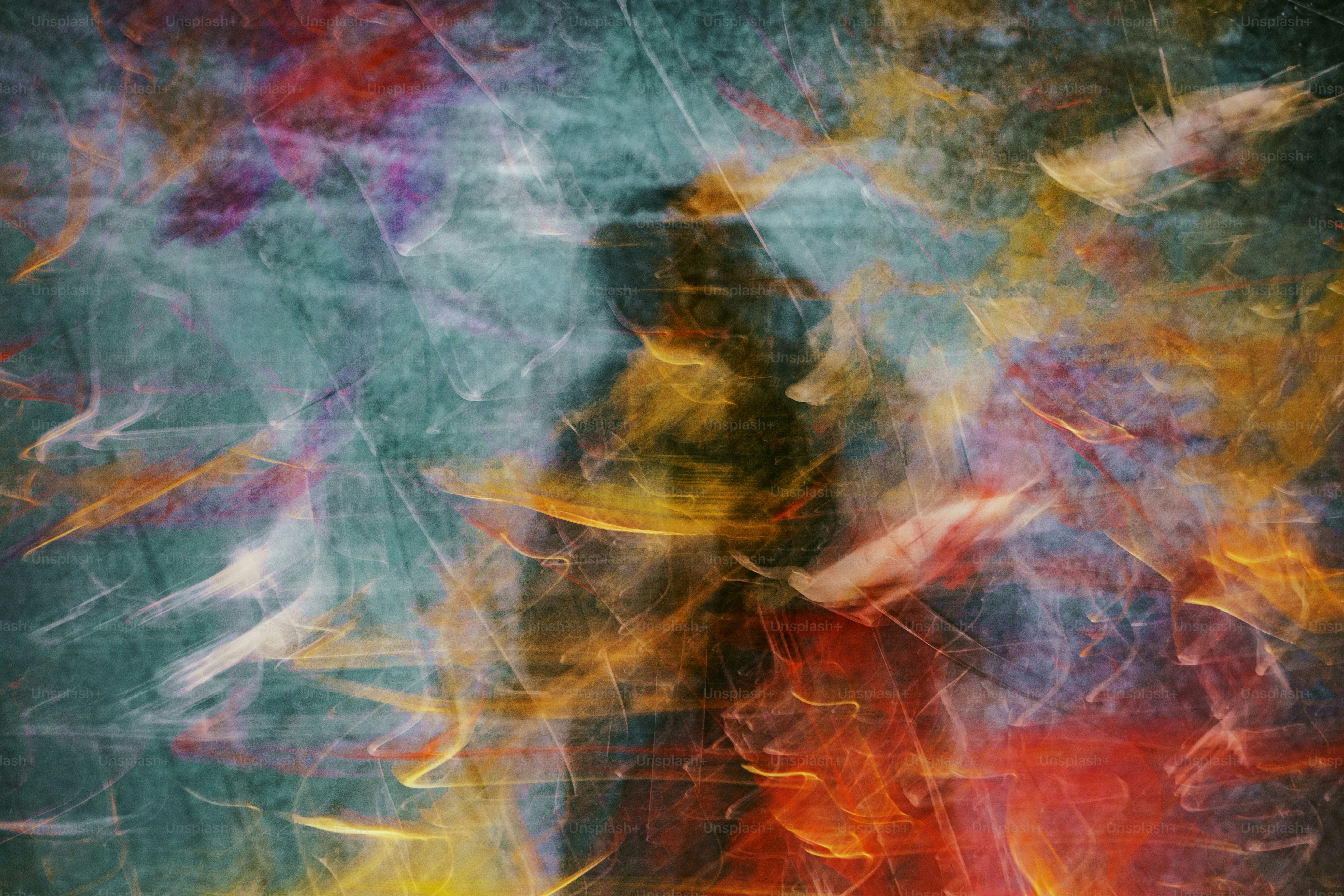 a blurry image of a person standing in front of a fire hydrant