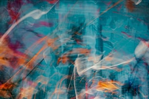 a blurry photograph of a blue and orange background