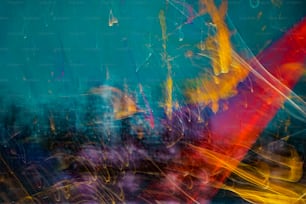 an abstract painting of a red, yellow, and blue object