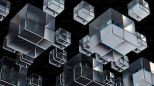 a group of glass cubes with a black background