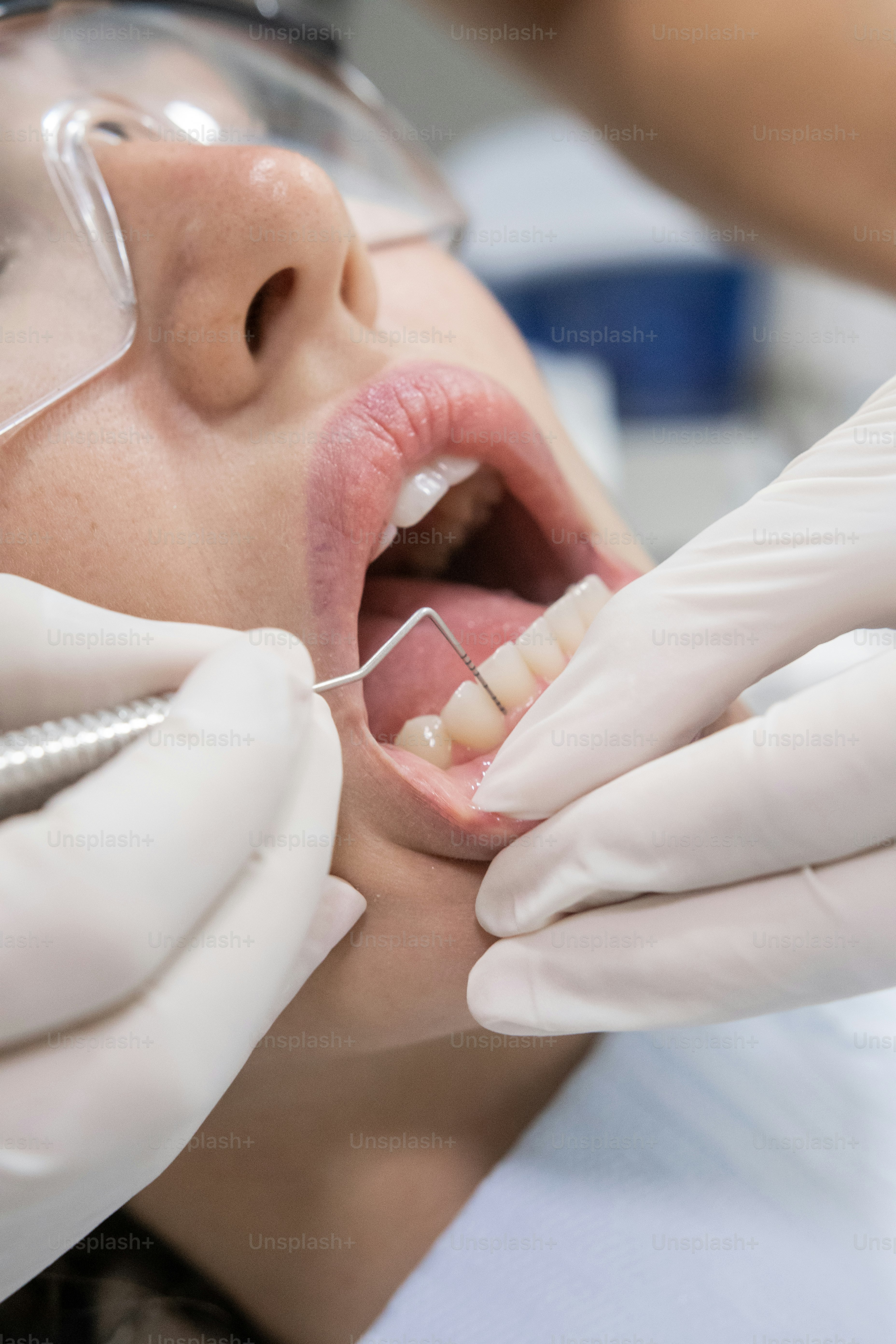 A peaceful dental treatment room with soft lighting