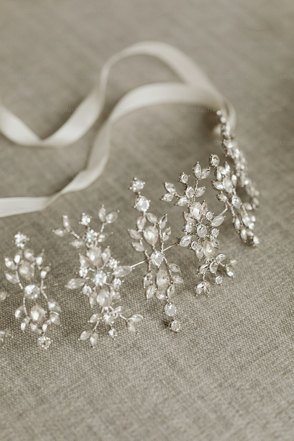 a close up of a bunch of jewelry on a table