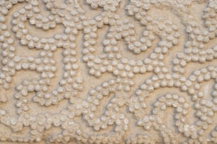a close up of a wall made of balls