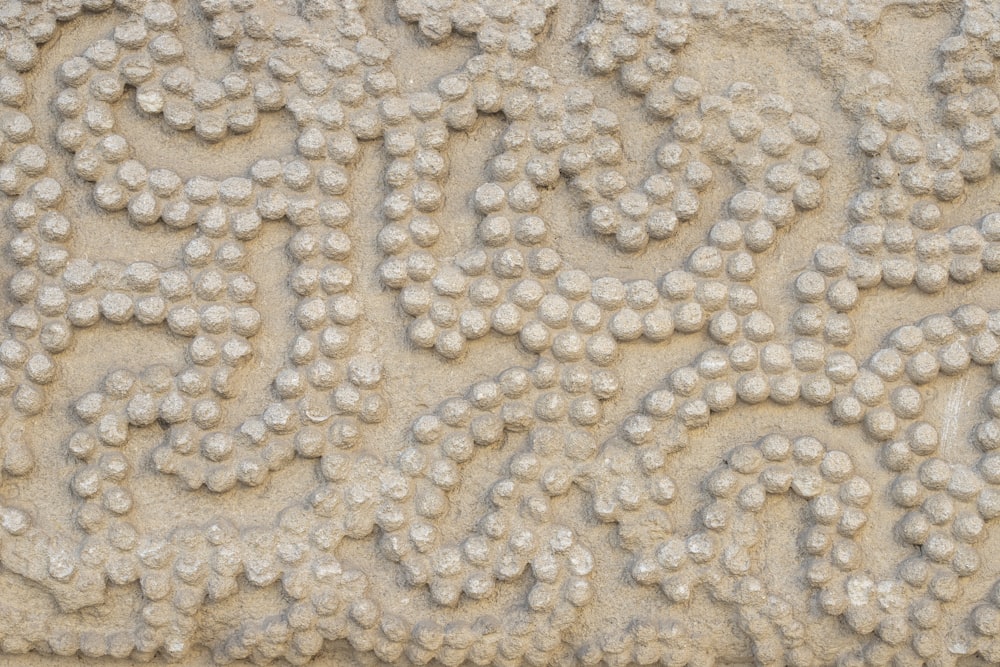 a close up of a wall made of balls