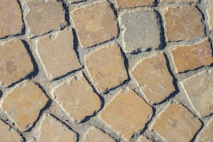 a close up of a cobblestone street