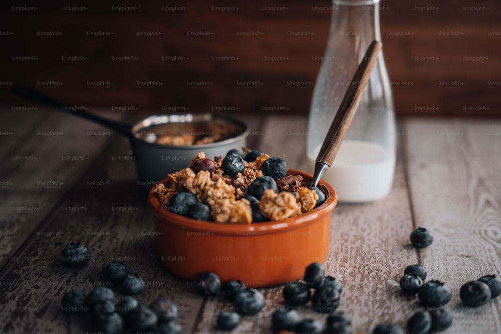 a bowl of cereal and a glass of milk