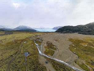 an aerial view of a valley with a river running through it