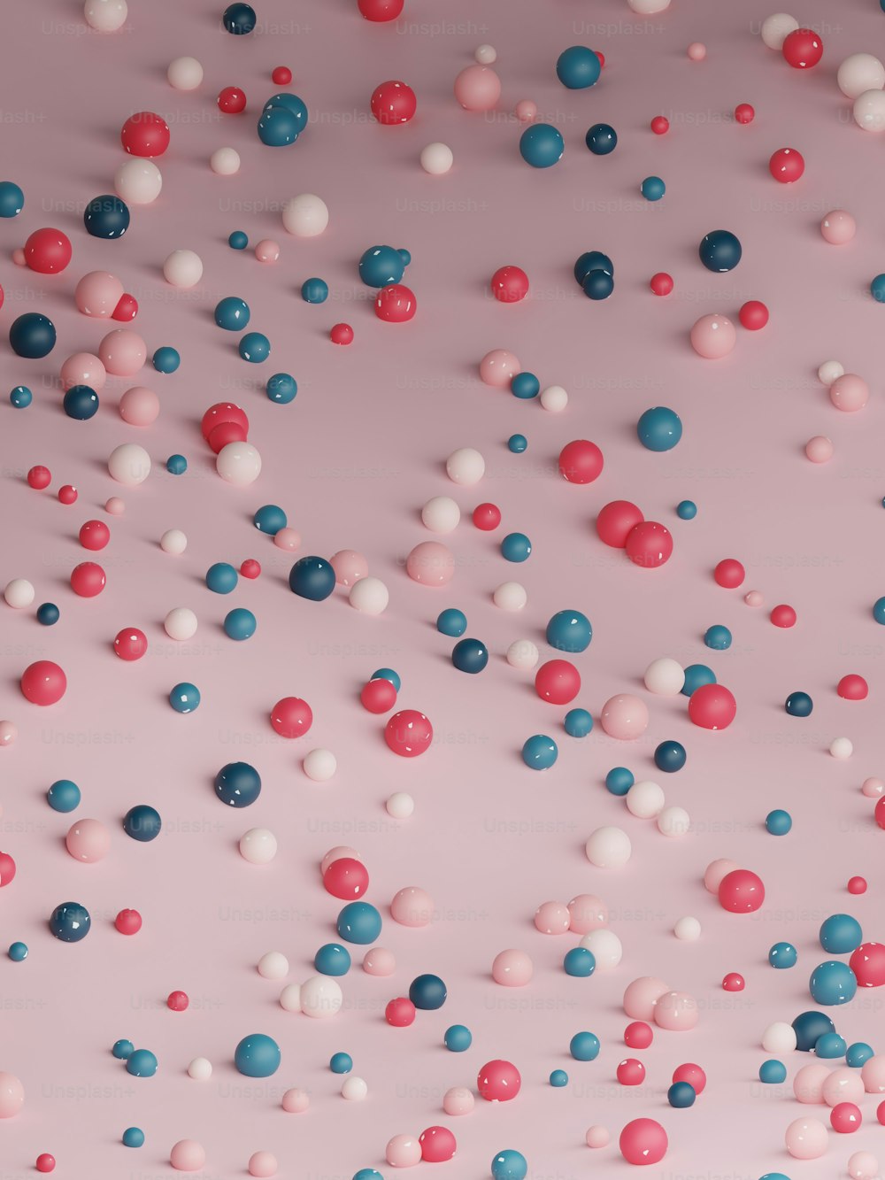 a pink background with red, white and blue balls