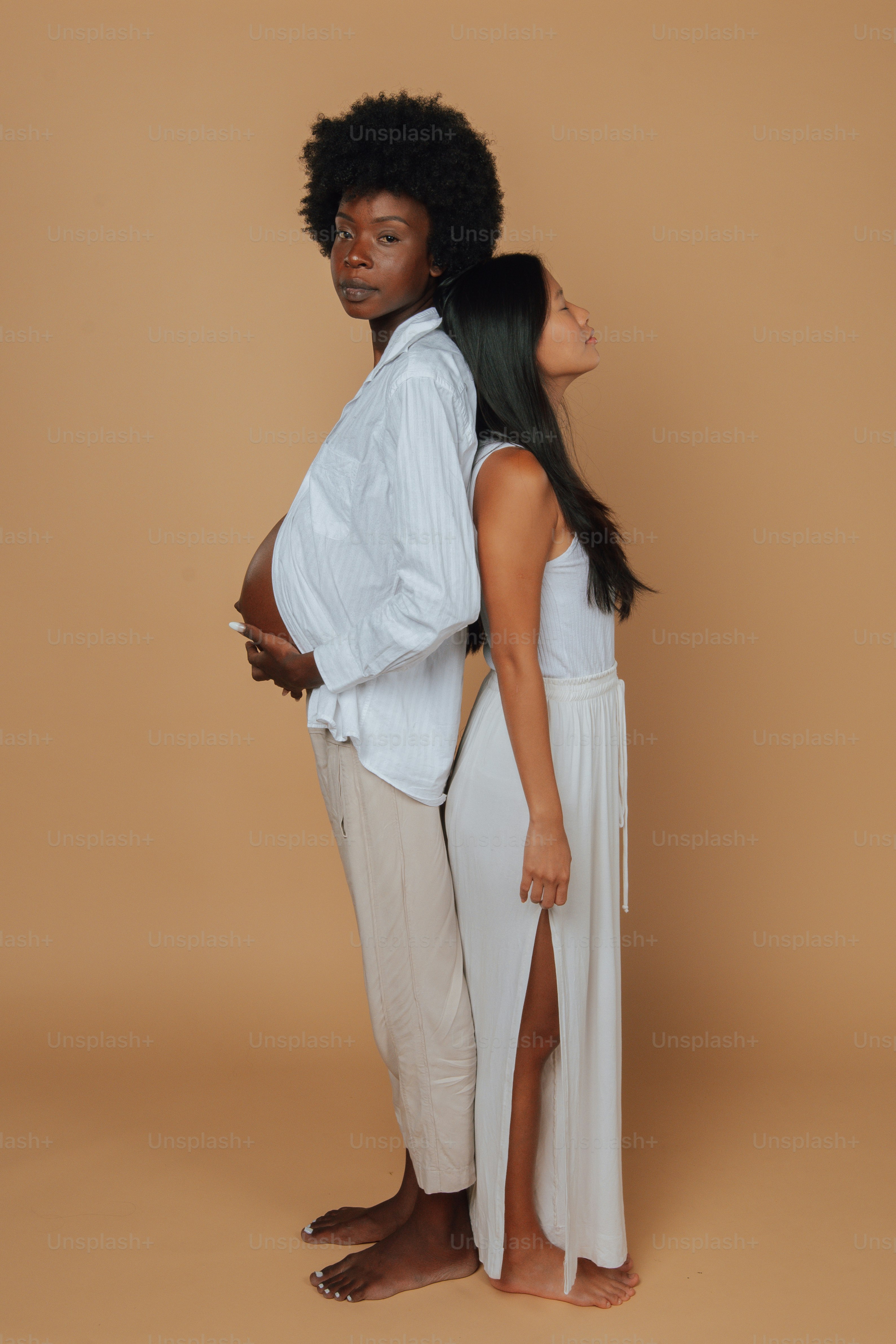 A man and a woman standing next to each other photo – Friendship Image ...