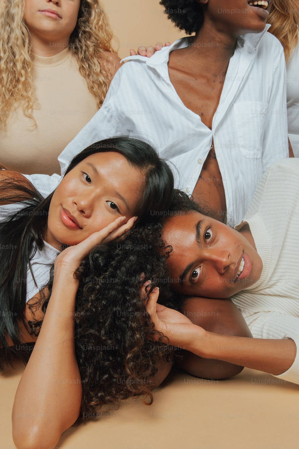 a group of women sitting next to each other