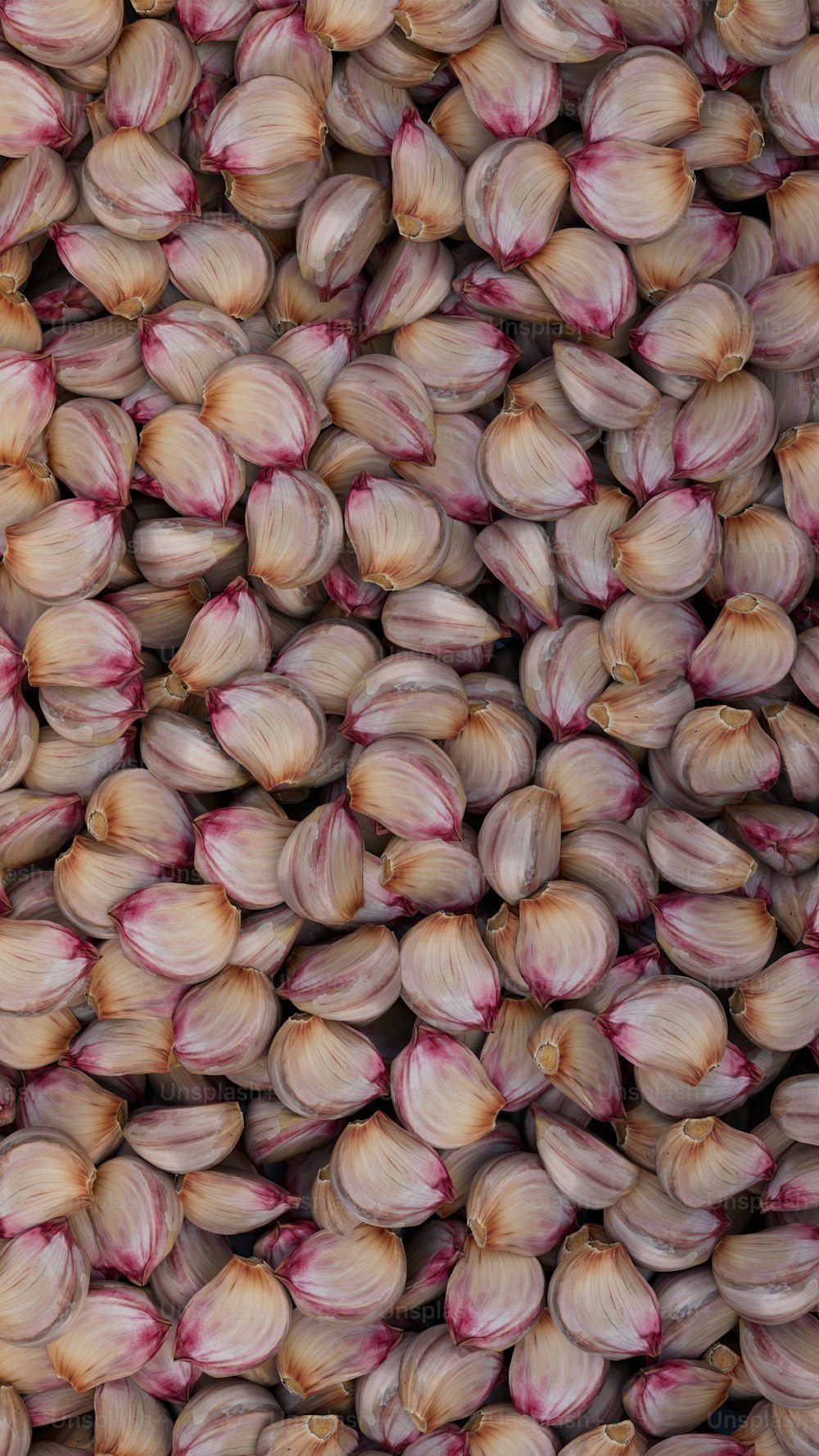 a bunch of garlic is piled high in the air