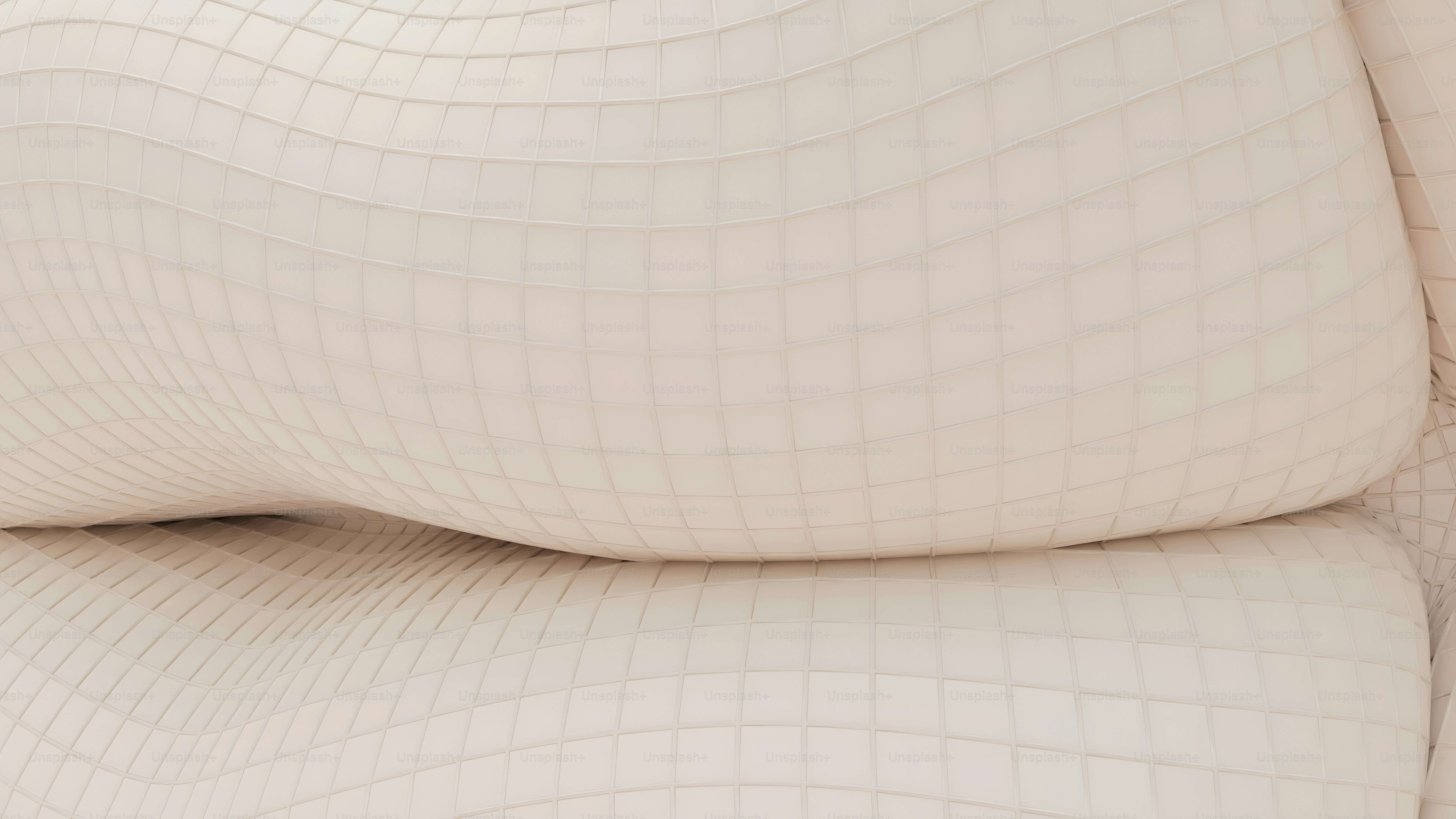 a close up of a white couch cushion