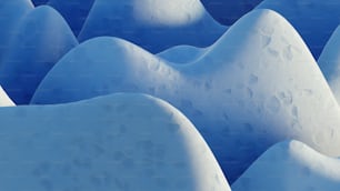 a group of snow mounds covered in snow