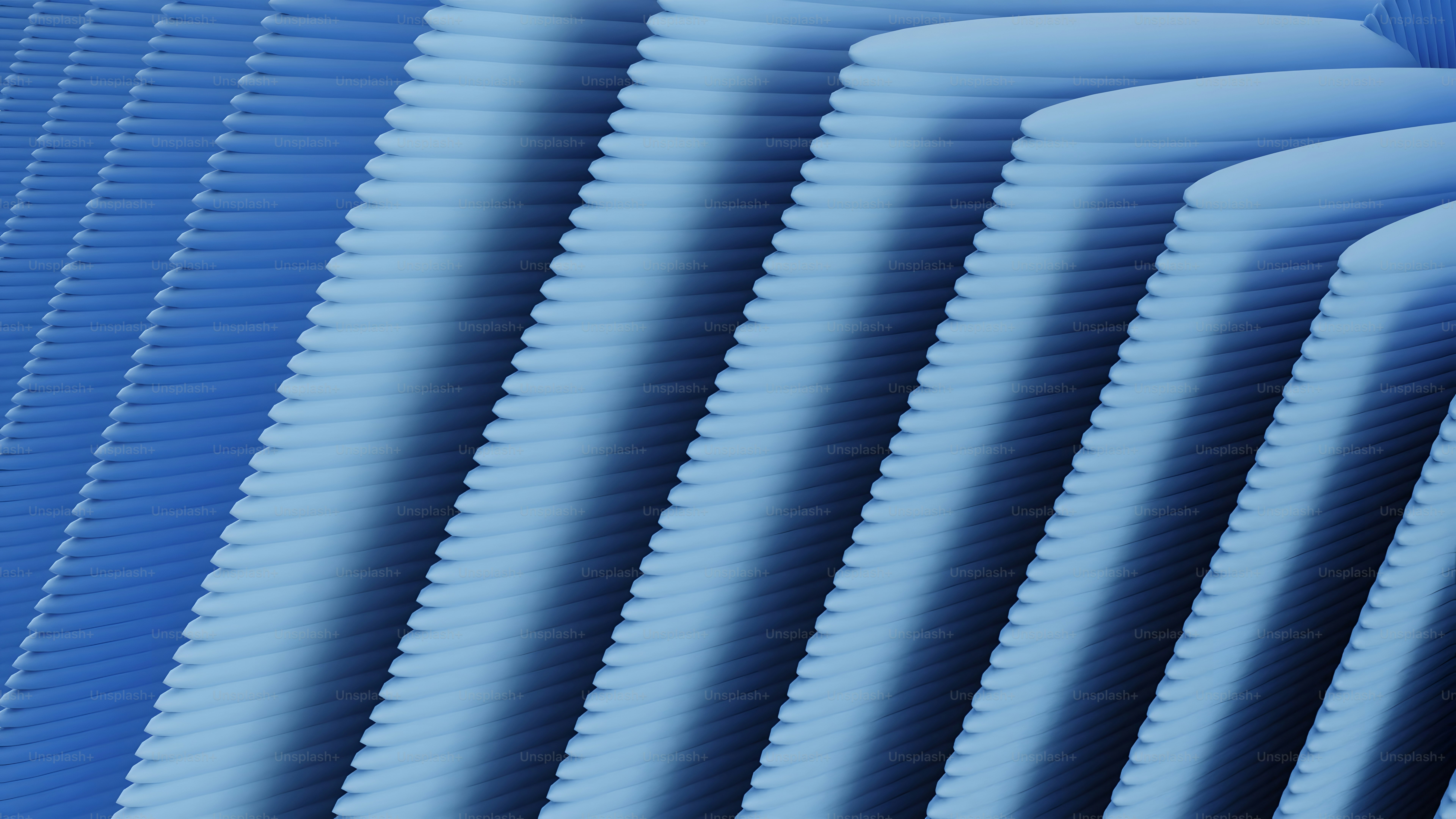 A close up of a blue background with wavy lines photo – Wallpapers ...