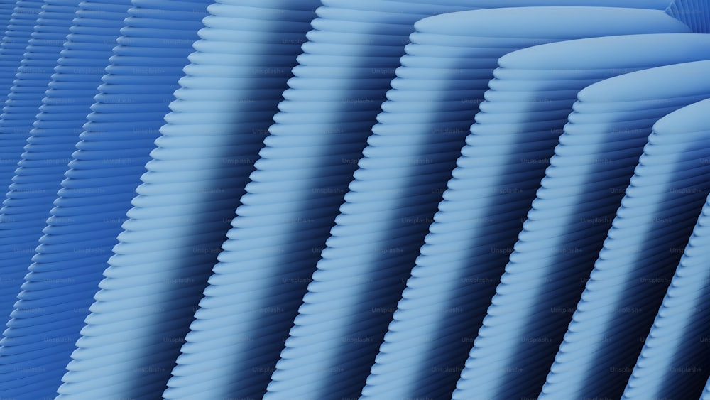 un gros plan d’un fond bleu avec des lignes ondulées