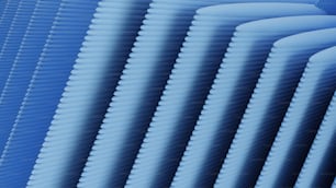 a close up of a blue background with wavy lines